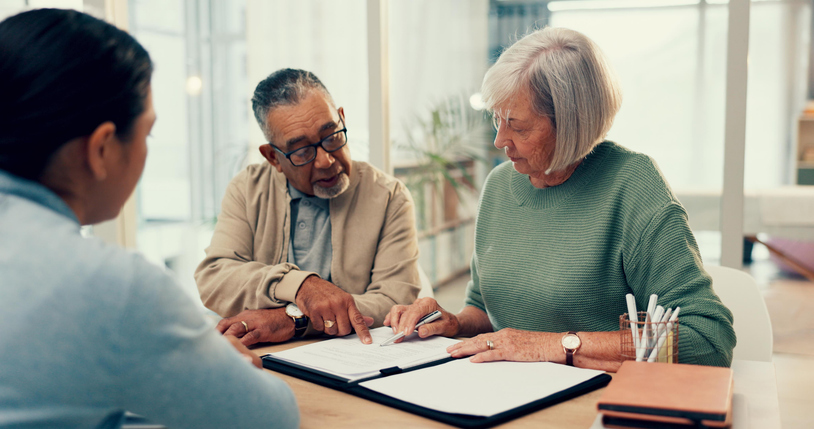 A financial advisor walking a senior couple through a Roth conversion strategy.